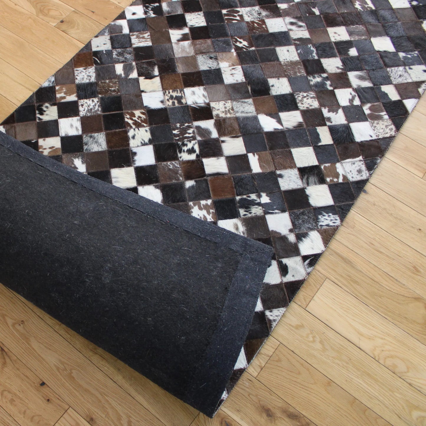 Patchwork Black Squares Cowhide Rug